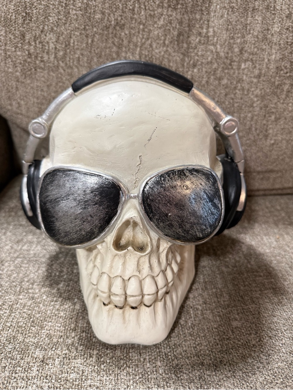 Halloween White Skull Figurine with Black Headphones and Silver Sunglasses